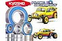 A promotional image for Plaig RC bearing kits featuring a Kyosho Beetle RC car and several metal ball bearings with blue rubber seals.
