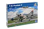 Italeri 1/48 scale F-4E Phantom II plastic model kit box featuring artwork of a camouflage fighter jet on a runway.