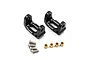 Two black aluminium RC front hub carriers with four metal screws and four brass bushings on a white background.