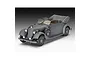 A studio shot of a 1/35 scale plastic model of a grey Mercedes-Benz Type 320 Cabriolet with the top down.