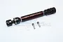 A brown GPM Racing steel front universal driveshaft for RC cars, shown with two small metal pins and two clear plastic washers on a white background.