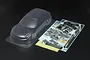 Tamiya 1/10 scale clear polycarbonate 2008 Subaru Impreza RC body shell with included decal sheet, chrome light buckets, and black plastic parts.