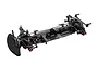 A high-performance 1/10 scale RC touring car chassis kit featuring a carbon fibre main deck and bronze-coloured metal components.