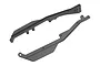 A pair of black plastic RC side rails for a chassis, shown from an angled perspective against a white background.