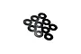 A set of ten small black circular shims or washers arranged in a loose cluster on a white background.