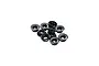A pile of ten small black metal M3 threaded inserts for RC cars against a white background.