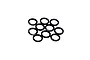 A cluster of ten small black circular rocker shims or washers arranged on a white background.