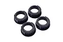 Four black plastic differential eccentric rings for RC cars arranged on a white background.
