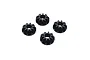 Four small black plastic bevel gears for an RC car differential arranged on a white background.