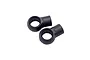 Two black plastic RC shock ball cups shown from a top-down perspective against a white background.