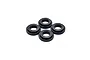 Four small black circular shock guides arranged in a cluster on a white background.