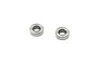 Two small metal shielded ball bearings isolated on a white background.