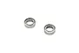 Two small metal shielded ball bearings isolated on a plain white background.