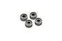 Four small metal shielded ball bearings arranged in a cluster against a white background.