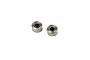 Two small metal shielded ball bearings isolated on a white background.