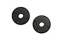 Two black circular RC shock pistons with a central hole and three smaller holes, shown on a white background.