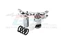 GPM Racing silver aluminium steering assembly for RC cars with a separate black coil spring on a white background.