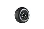 A single Louise SC-Turbo RC short course tyre mounted on a black spoked rim with gold-coloured lug nut details, isolated on a white background.