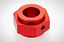 A single red anodized aluminium disc brake hex adapter for RC vehicles, shown from a high angle against a white background.