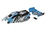A pre-painted blue, white, and black Team Associated RB10 1/10 scale buggy body shell with a matching rear wing and a small black mounting component.