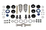 Team Associated V2 shock absorber kit components including metal shock bodies, shafts, plastic parts, O-rings, and a small wrench on a white background.